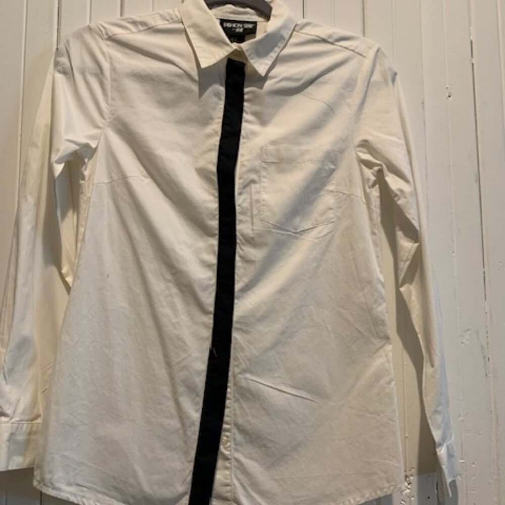 H&M Fashion Star long sleeve button down white shirt with black placket.